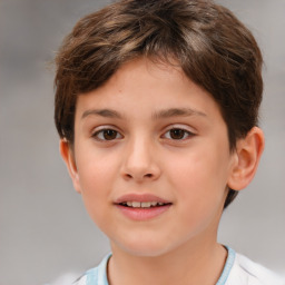 Joyful white child female with short  brown hair and brown eyes