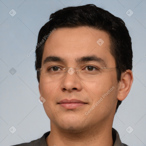 Joyful white young-adult male with short  black hair and brown eyes