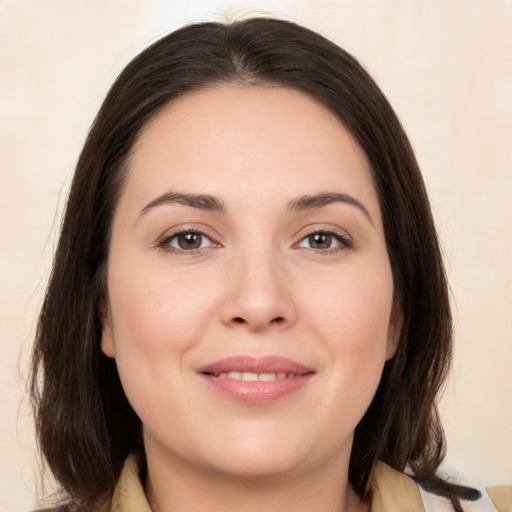 Joyful white young-adult female with medium  brown hair and brown eyes