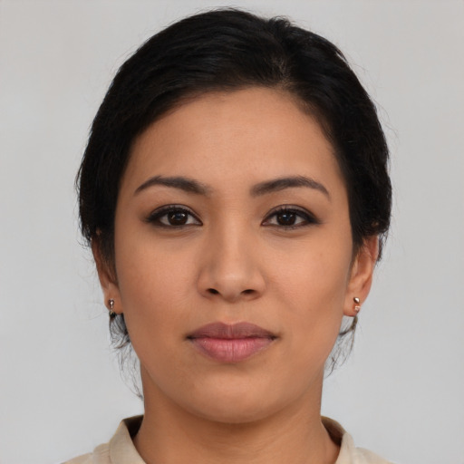 Neutral latino young-adult female with medium  black hair and brown eyes