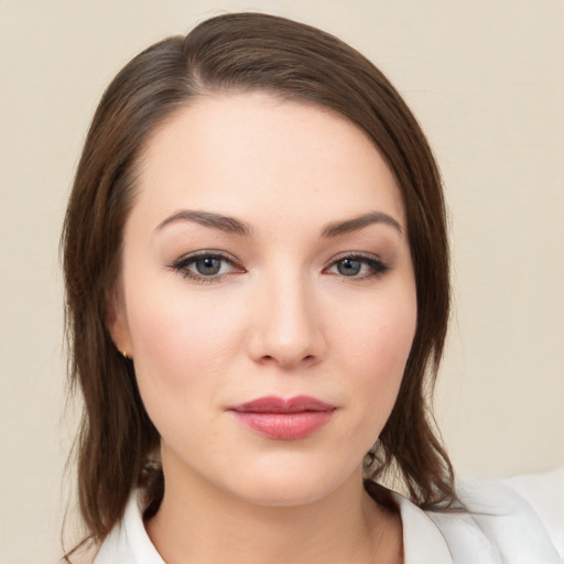 Neutral white young-adult female with medium  brown hair and brown eyes