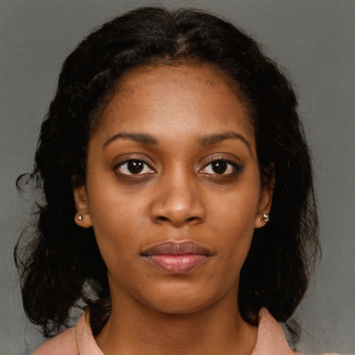 Neutral black young-adult female with medium  brown hair and brown eyes