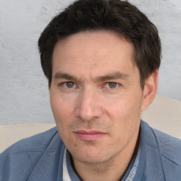 Neutral white adult male with short  brown hair and brown eyes