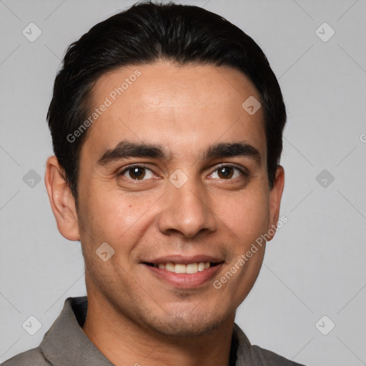 Joyful white young-adult male with short  black hair and brown eyes