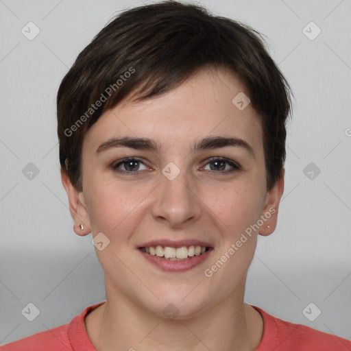 Joyful white young-adult female with short  brown hair and brown eyes