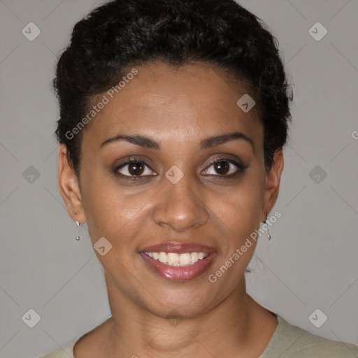 Joyful black young-adult female with short  brown hair and brown eyes