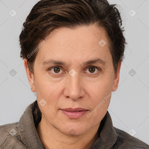 Joyful white adult female with short  brown hair and brown eyes