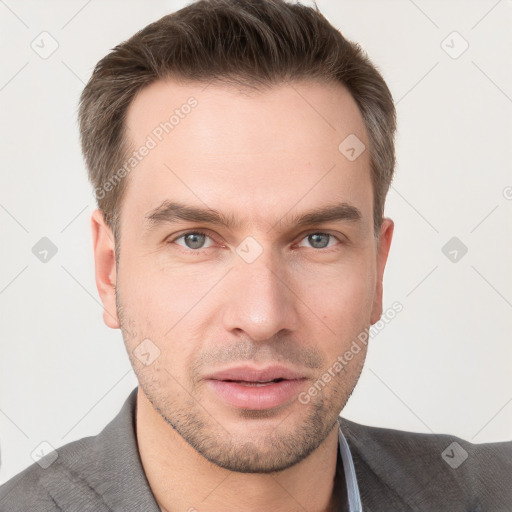 Neutral white young-adult male with short  brown hair and grey eyes