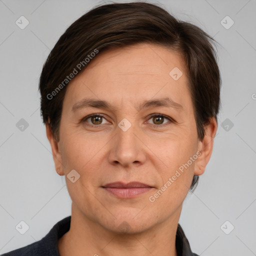 Joyful white adult female with short  brown hair and brown eyes