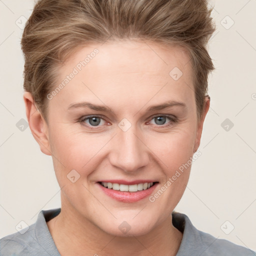 Joyful white young-adult female with short  brown hair and grey eyes