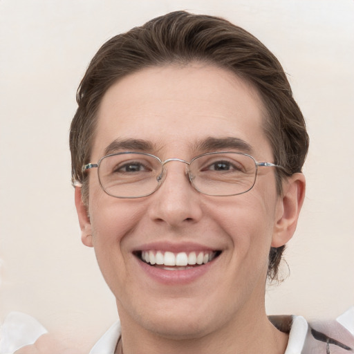 Joyful white adult male with short  brown hair and grey eyes