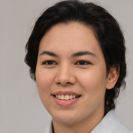 Joyful asian young-adult female with medium  brown hair and brown eyes