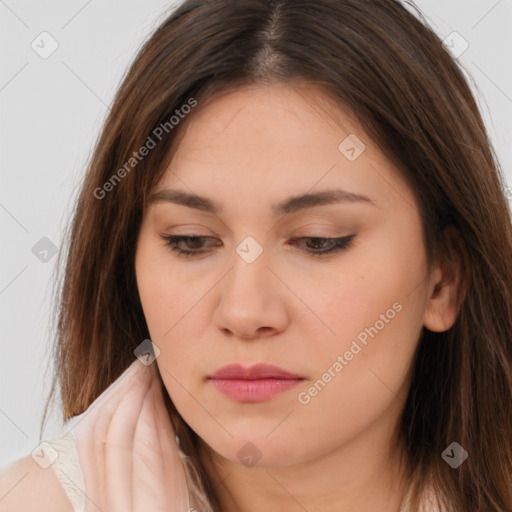 Neutral white young-adult female with long  brown hair and brown eyes