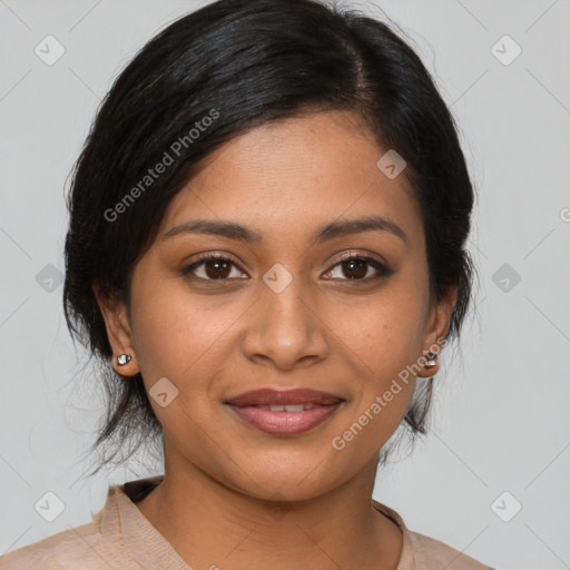 Joyful latino young-adult female with medium  brown hair and brown eyes