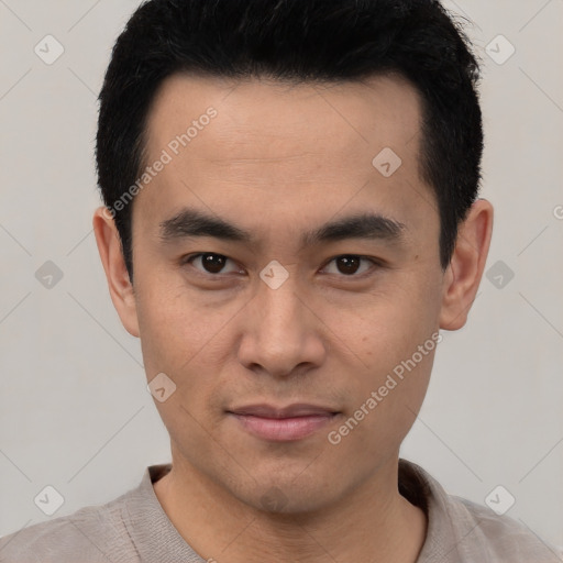 Joyful latino young-adult male with short  black hair and brown eyes