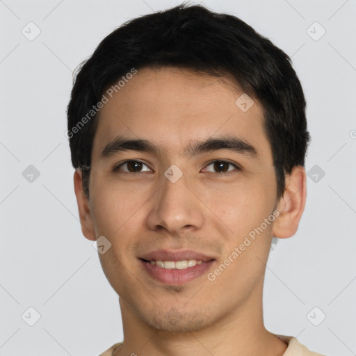 Joyful asian young-adult male with short  brown hair and brown eyes