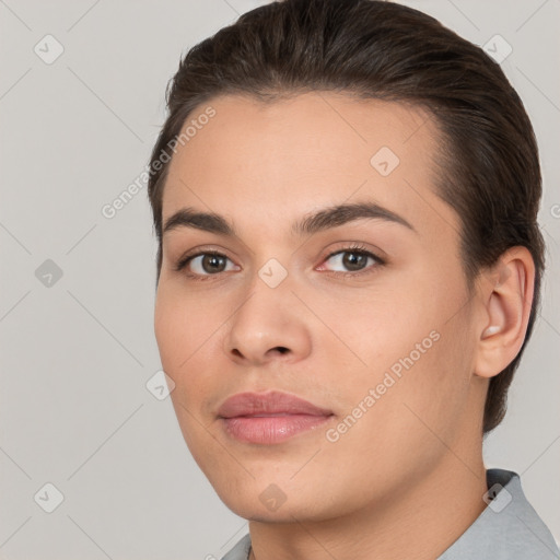 Joyful white young-adult female with short  brown hair and brown eyes