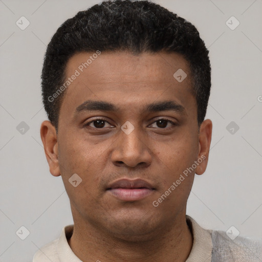 Neutral latino young-adult male with short  black hair and brown eyes