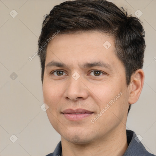 Joyful white adult male with short  brown hair and brown eyes