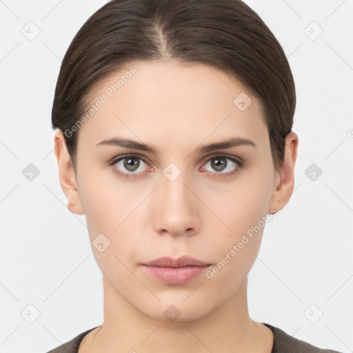 Neutral white young-adult female with short  brown hair and brown eyes