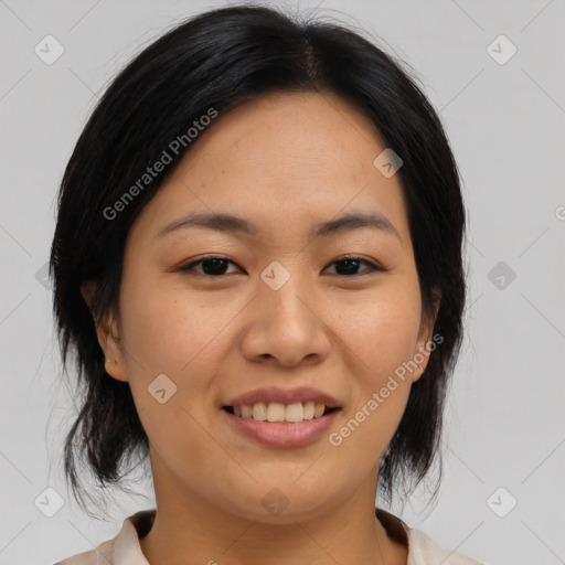 Joyful asian young-adult female with medium  brown hair and brown eyes