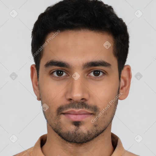 Neutral latino young-adult male with short  black hair and brown eyes