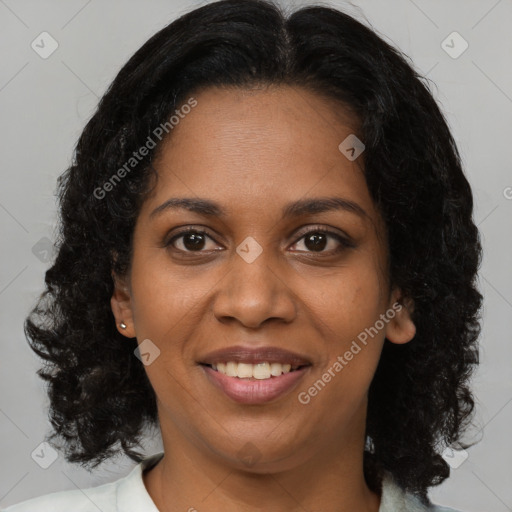 Joyful black young-adult female with medium  brown hair and brown eyes