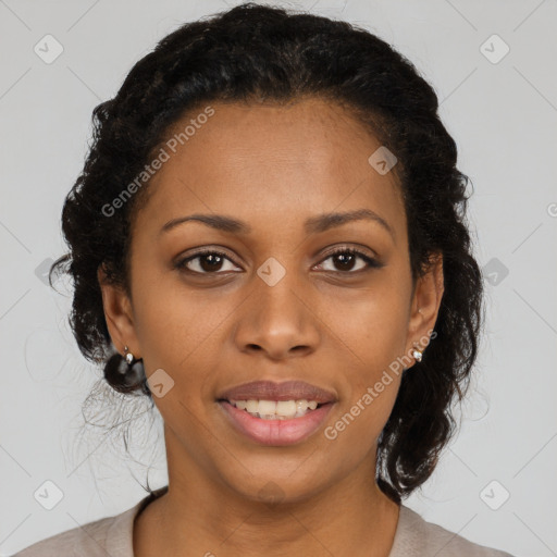 Joyful black young-adult female with long  brown hair and brown eyes