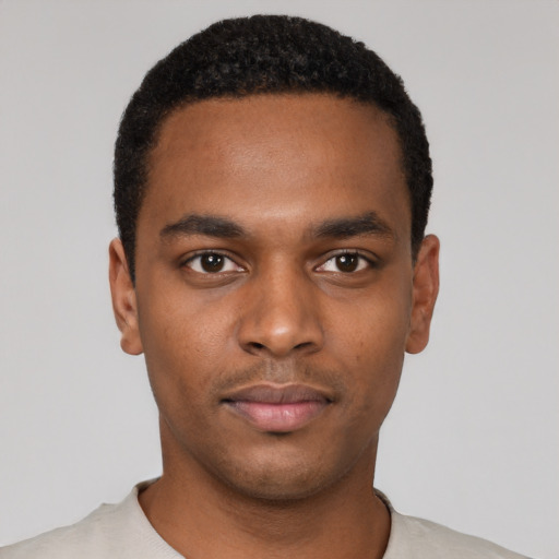Neutral black young-adult male with short  black hair and brown eyes