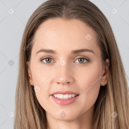 Joyful white young-adult female with long  brown hair and grey eyes