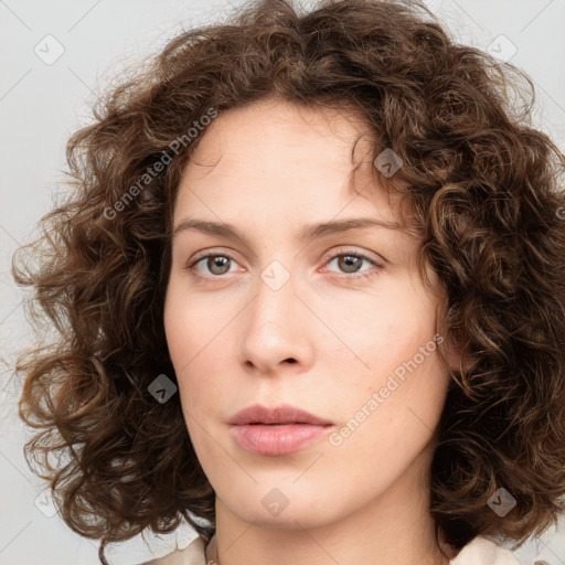 Neutral white young-adult female with medium  brown hair and green eyes