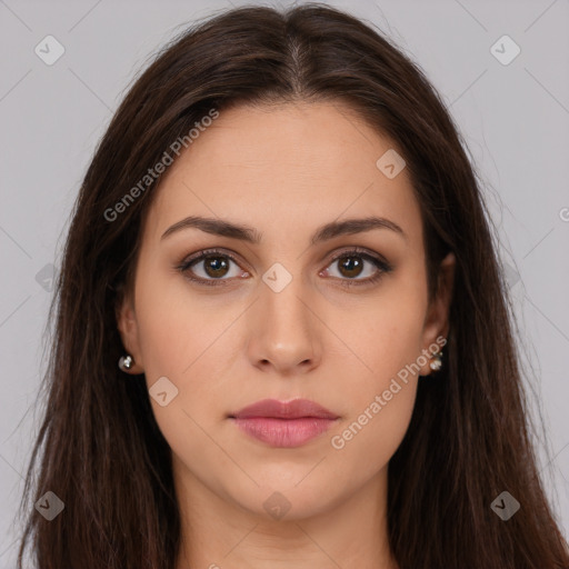 Neutral white young-adult female with long  brown hair and brown eyes