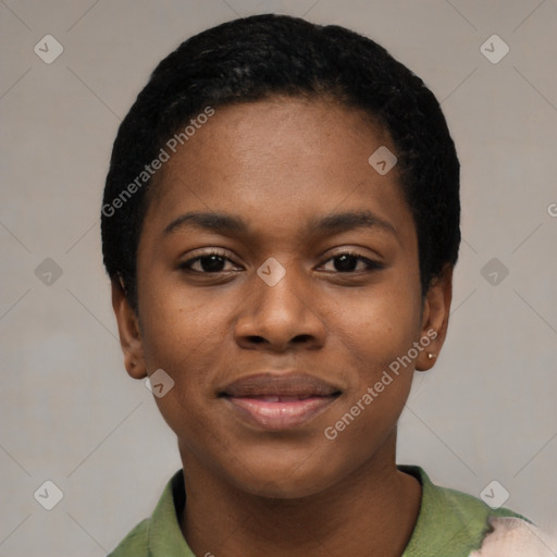 Joyful black young-adult female with short  black hair and brown eyes