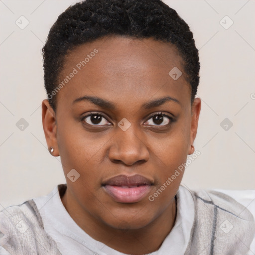 Joyful black young-adult female with short  brown hair and brown eyes