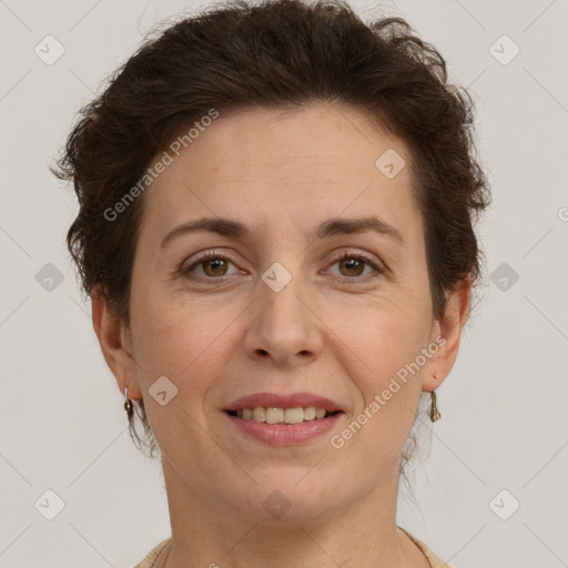 Joyful white adult female with short  brown hair and brown eyes