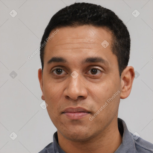 Neutral latino adult male with short  black hair and brown eyes