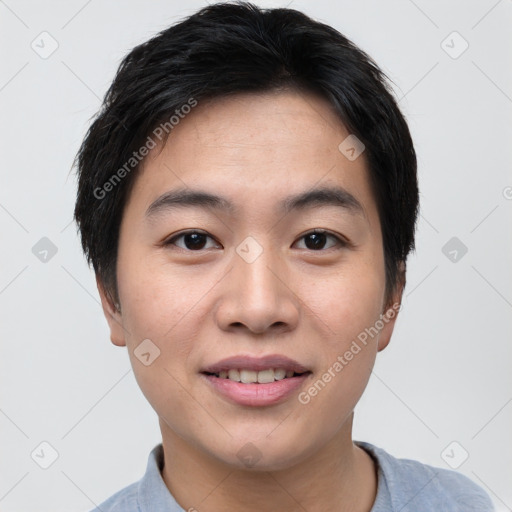 Joyful asian young-adult male with short  black hair and brown eyes