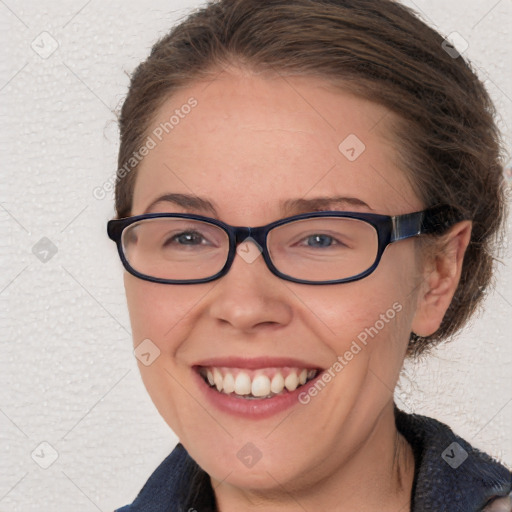 Joyful white young-adult female with short  brown hair and blue eyes