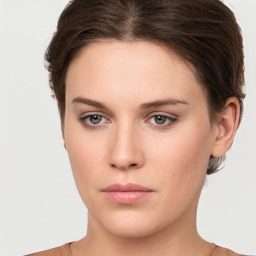 Neutral white young-adult female with short  brown hair and brown eyes