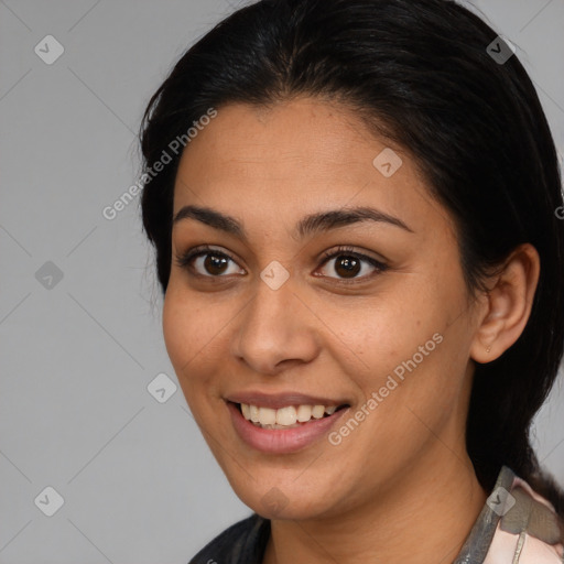 Joyful latino young-adult female with medium  brown hair and brown eyes