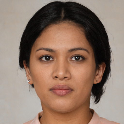 Neutral asian young-adult female with medium  black hair and brown eyes