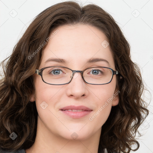 Joyful white young-adult female with long  brown hair and green eyes