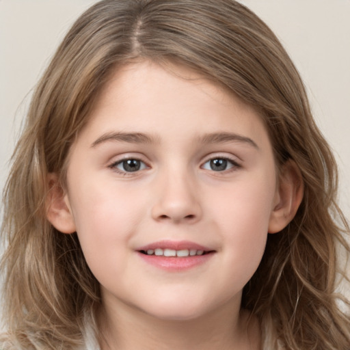 Joyful white child female with long  brown hair and brown eyes