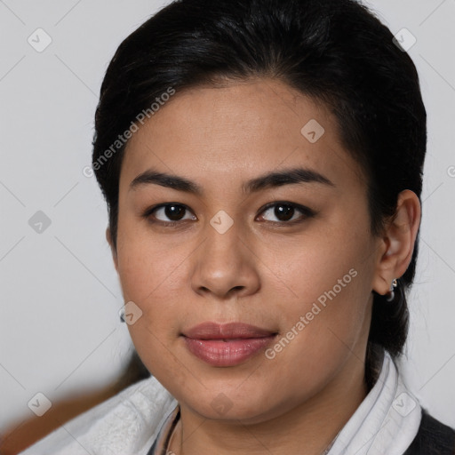 Joyful latino young-adult female with short  brown hair and brown eyes