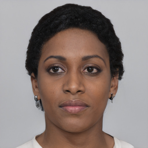 Neutral black young-adult female with short  black hair and brown eyes