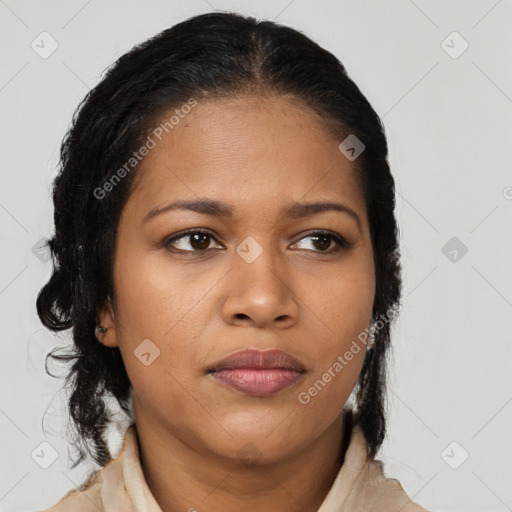 Joyful black young-adult female with medium  brown hair and brown eyes