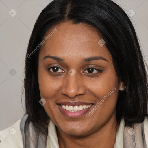Joyful latino young-adult female with medium  brown hair and brown eyes