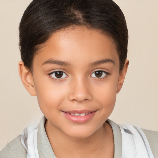 Joyful white child female with short  brown hair and brown eyes