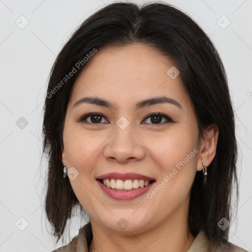 Joyful asian young-adult female with medium  brown hair and brown eyes