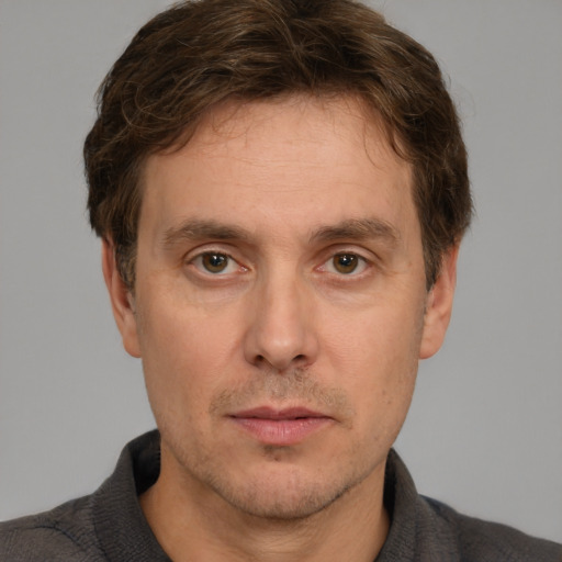 Neutral white adult male with short  brown hair and brown eyes